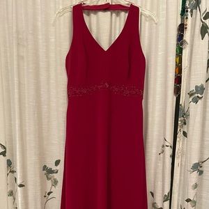 Size 10 red David’s Bridal bridesmaid/formal floor length gown with beading